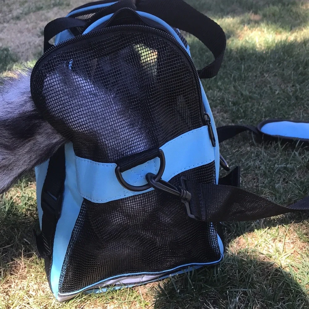 - Pet Carrier with shoulder strap light blue and black well vented used 1x